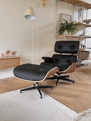 Eames lounge chair met Ottoman in palissander en echt zwart leer Repli
